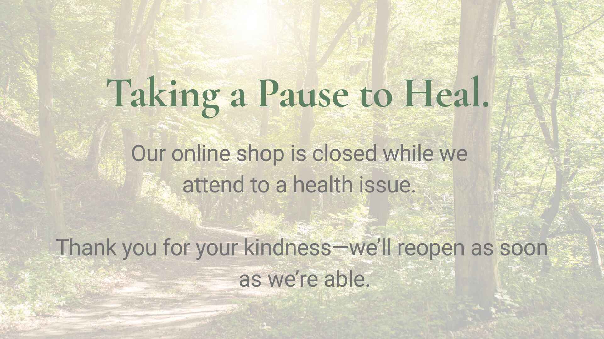 Message about a closed online shop due to a health issue with a forest background.